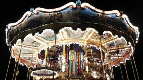 Spinning Lit-Up Carousel at Night