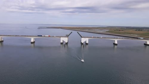 descending drone footage of the open zeeland bridge over the eastern scheldt in the province zeeland