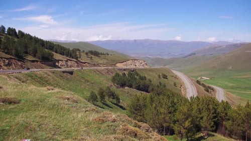 The Mountain Serpentine and Cars Drive Along the Road in Armenia