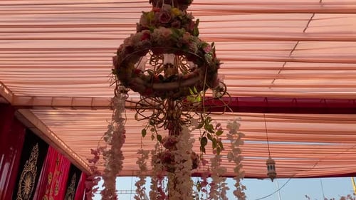 Ornate Floral Chandelier Hanging at Outdoor Event