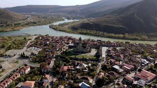 Panorama of Mtskheta village nestled along the tranquil banks of the Mtkvari river in Georgia
