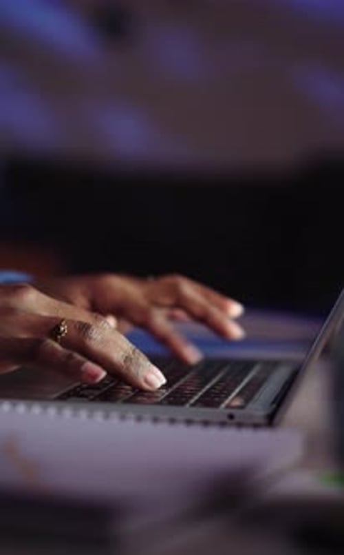 Black Woman Hands Using Computer to Work From Home During Nighttime