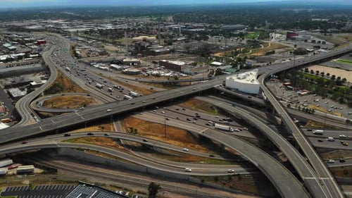 Aerial time lapse of traffic at huge interchange on i-25 in Denver, Colorado