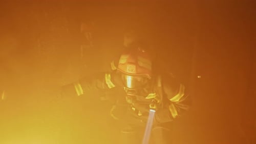 Firefighters Bravely Navigate SmokeFilled Corridor to Rescue Lives in Fire