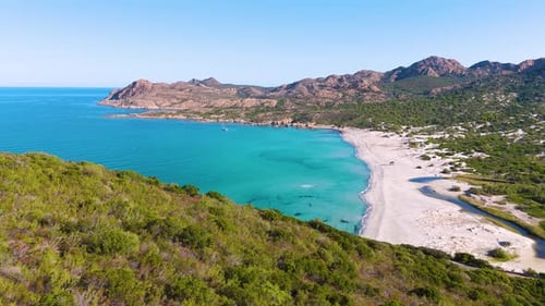Aerial drone view of Plage de l'Ostriconi, Mediterranean beach, Corsica, France