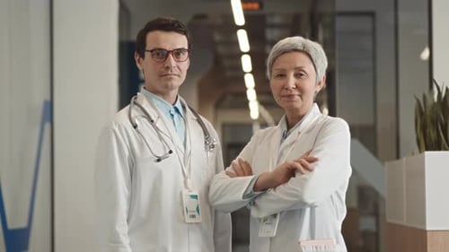 Portrait of Diverse Couple of Doctors in Hospital