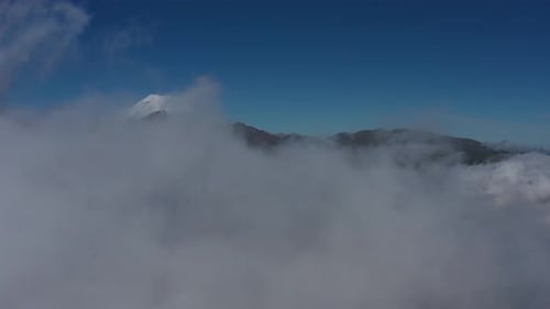 Aerial View of Clouds and Mountains at Sunrise