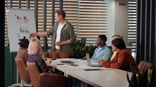 Professionals Collaborating During Meeting in Modern Office