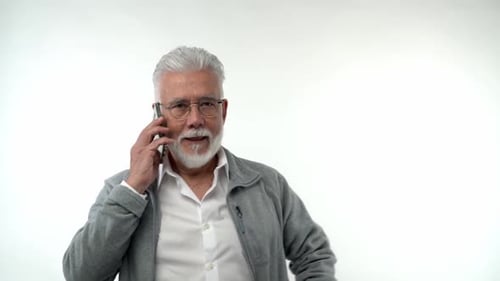 Senior Man Talking on Mobile Phone