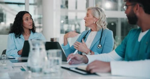 Coaching, healthcare and meeting with people in boardroom of hospital together for planning