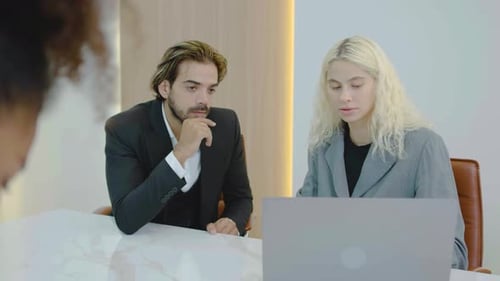 Smiling caucasian businesswoman executive talking to colleagues executive team diverse partners