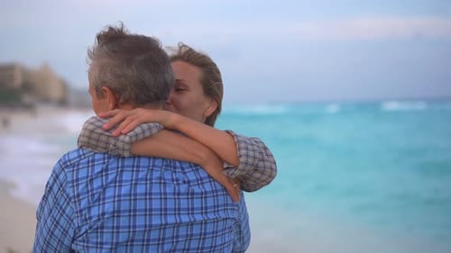 Romantic Middleaged Couple Enjoying a Peaceful Evening Together on the Beach Love Connection and