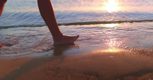 Close Up Barefoot Legs Walk Sunset Sand Beach