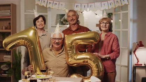 Group Celebrates Milestone Birthday With Balloons