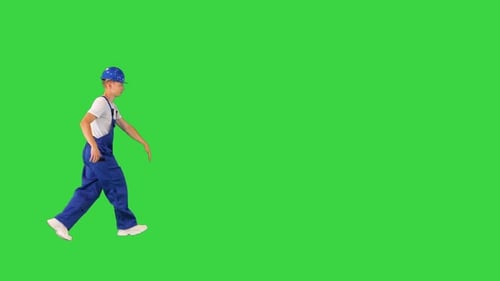 Happy and Excited Construction Worker Walking and Dancing on a Green Screen Chroma Key
