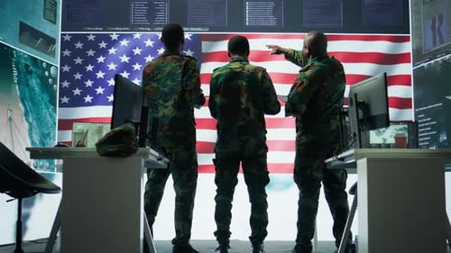 US Soldiers in a High Tech Command Center Protecting Classified Information