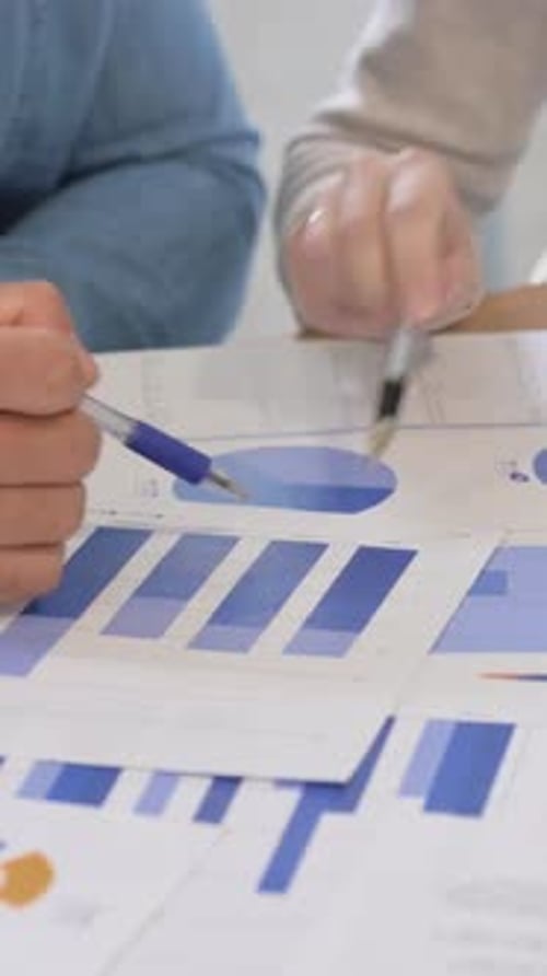Close Up of People Doing Paperwork, vertical video