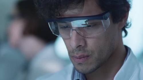 Young Adult Man Working in a Lab