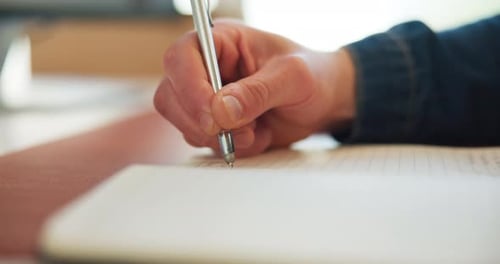 Creative, writing and hands with notebook, office and planning for article, journalist and research