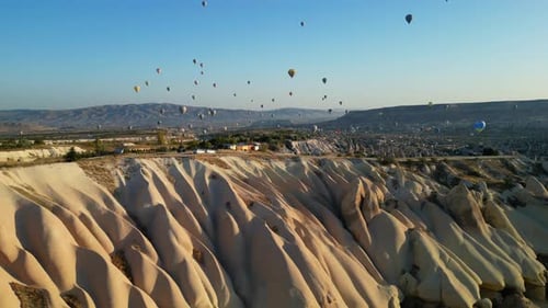 Majestic Hot Air Balloons Over Cappadocia Landscape