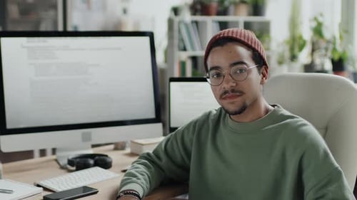 Young Programmer Working in IT Office
