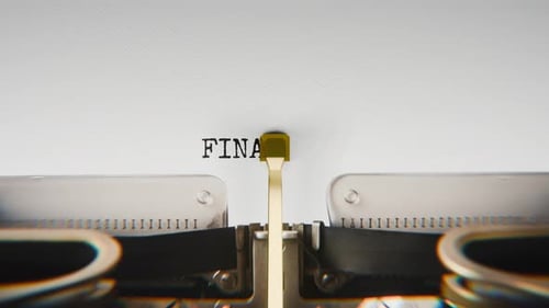 Old mechanical typewriter typing Final Ruling in a close-up view.