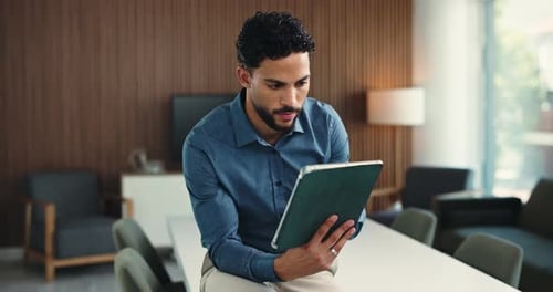 Journalist, reading or man in office with tablet, draft review or research for article update