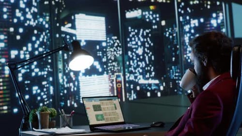 Rich Executive Director Admiring Skyscraper View at Night