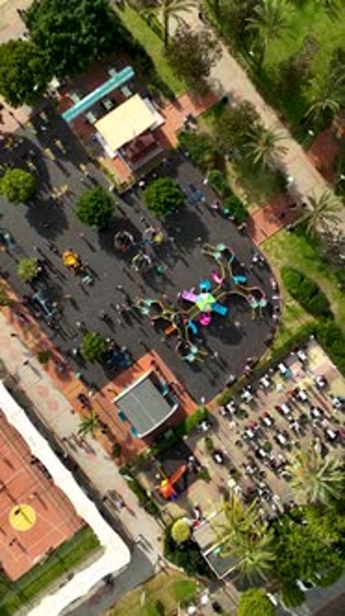 Vertical Video Children Play on the Big Playground Aerial View
