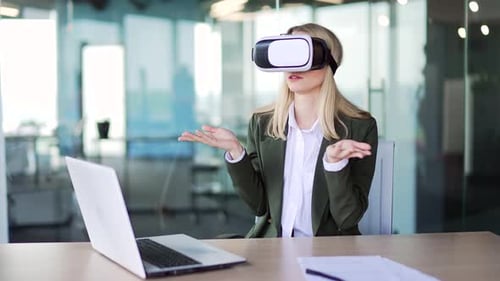 Woman Using Virtual Reality Headset in Office