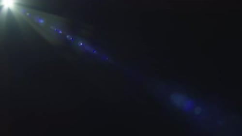 Lucent Zoom Collection: Streaked spherical lens flare with a violet hue with the fade out effect sho