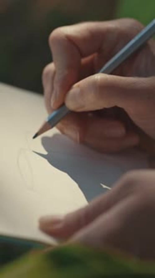 Hand Drawing on Paper with Pencil