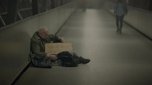 Elderly Homeless Man Suffering From Poverty Looking for Help at Train Station