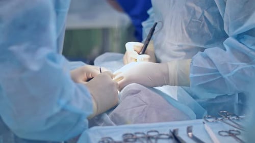 Medical Operation in Brightly Lit Operating Room