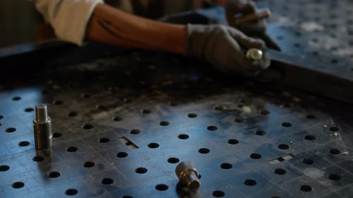 Woman Working With Metal Details