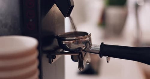 Coffee machine, barista hand and grind beans in cafe, closeup and prepare latte