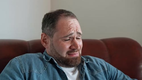 Stressed Person On The Sofa
