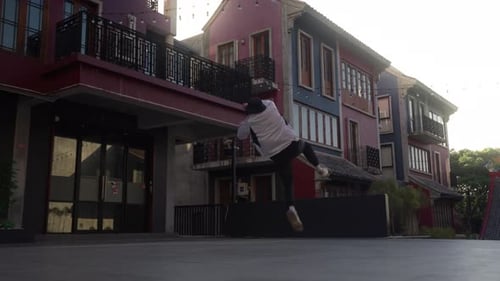 Young Breakdancer Spinning In Bangkok Street