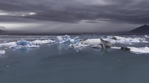 Aerial View of Jokulsarlon Glacier Lagoon with Icebergs and Mountains