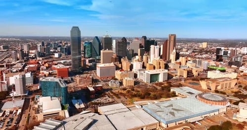 Low-rise buildings surrounding the skyscrapers in the downtown of Dallas, Texas, USA.