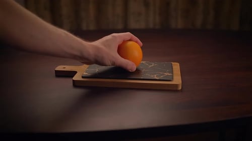 Bright Orange Placed on Charcuterie Board Indoors