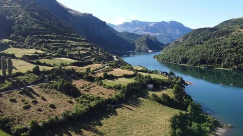Lake Embalse de Bubal at Valle de Tena Valley in Huesca, Aragon, Spanish Pyrenees, Spain - Aerial Dr