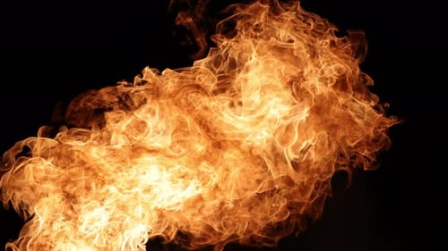 Burning fire flares on a black background