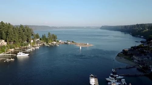 Blue Sky Over The Yachts And Sailboats Anchored At The Gig Harbor Marina And Boatyard In Washington