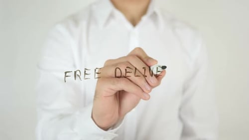 Writing Free Delivery on Clear Surface with Marker