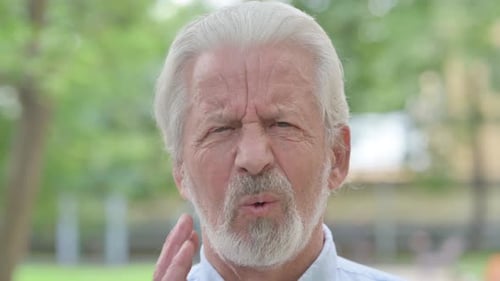 Close up of Senior Old Man Face with Toothache, Outdoor