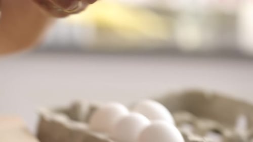 Cracking Egg for Holiday Baking