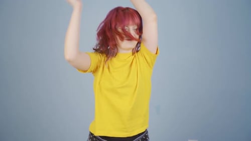 Enthusiastic Woman Dancing with Joy and Energy