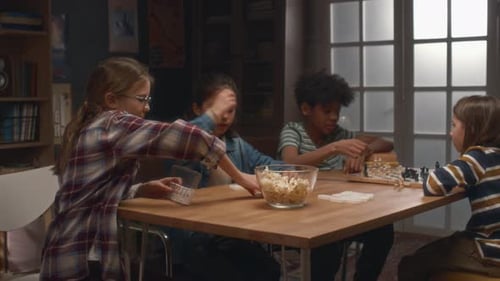 Girls Playing Domino at Board Games Club
