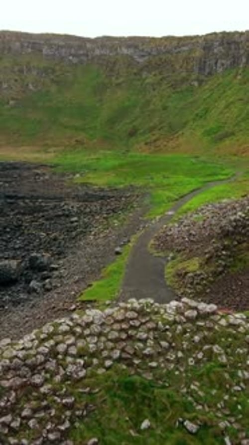 Social ratio advancing aerial video of The Giant's Causeway in Bushmills, Antrim in Northern Ireland